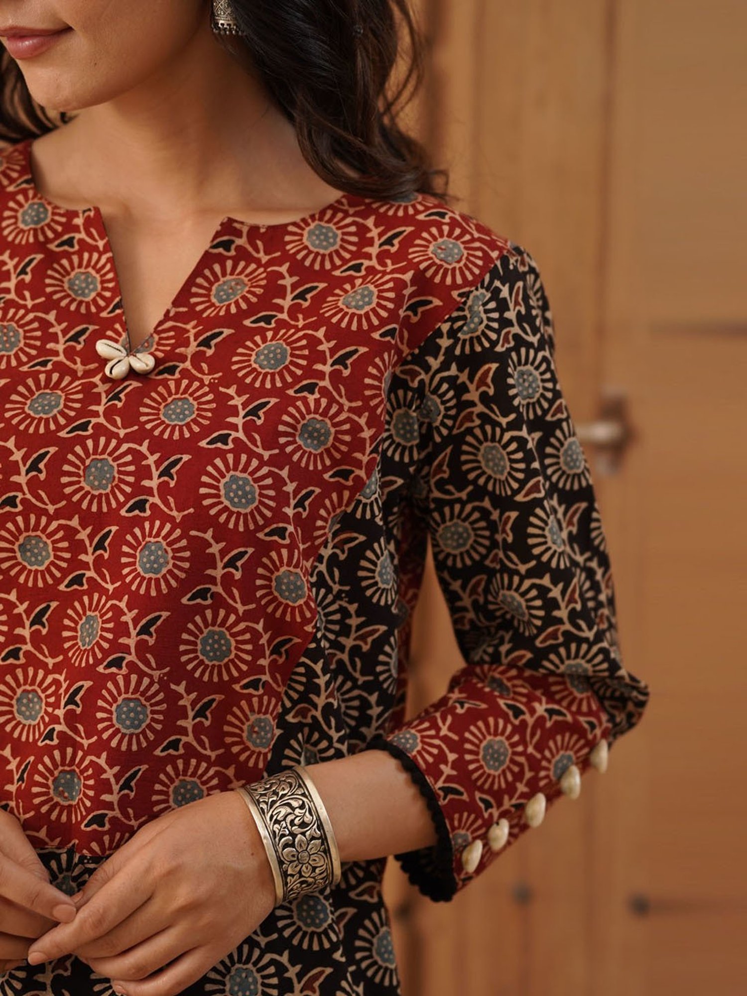 Love Chic Ajrakh Cotton Kurta with cowrie shells and crochet lace details