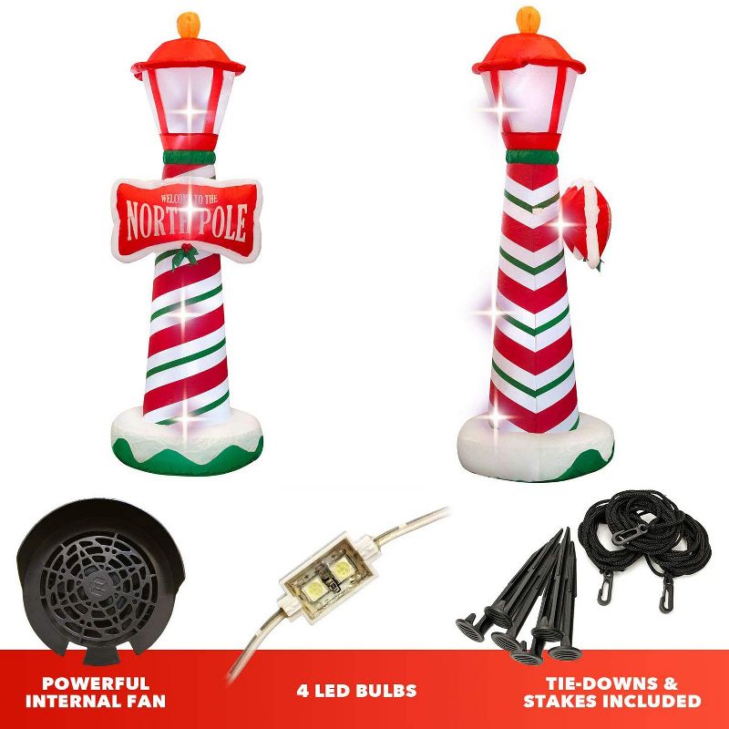 Holidayana 6 Foot Tall Giant Inflatable North Pole Lamp Post Holiday Ornament Yard Decoration with Blower Fan, Tie Down Straps, & Ground Anchor Stakes