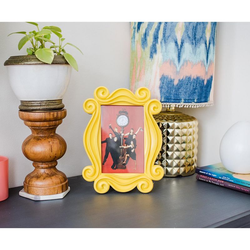 Robe Factory LLC Friends Yellow Door Polyresin Photo Frame With Stand | 10 x 7.5 Inches