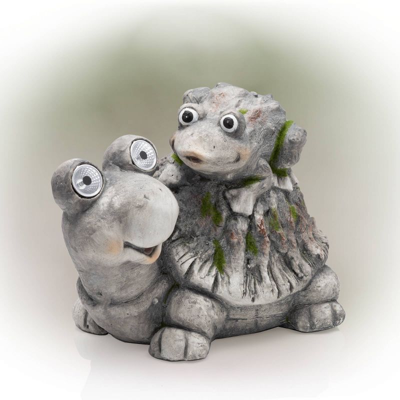 Alpine 11" Solar Turtles LED Light Magnesium Oxide Statue Brown