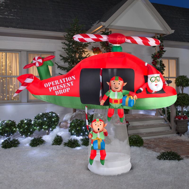 Gemmy Animated Christmas Airblown Inflatable Santa and Elves in Helicopter Scene Giant, 8 ft Tall