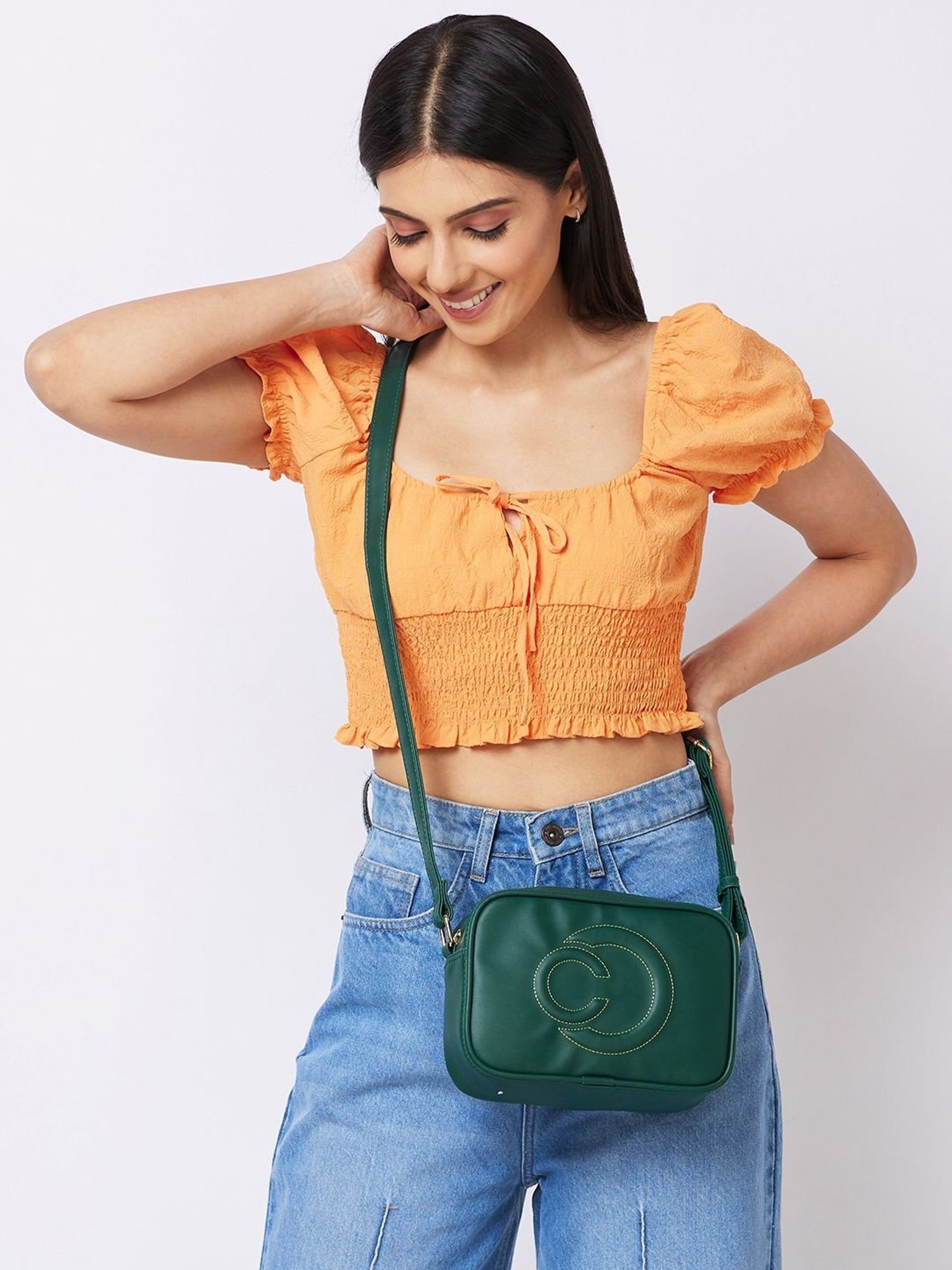 Caprese Dark Green Solid Medium Sling Handbag