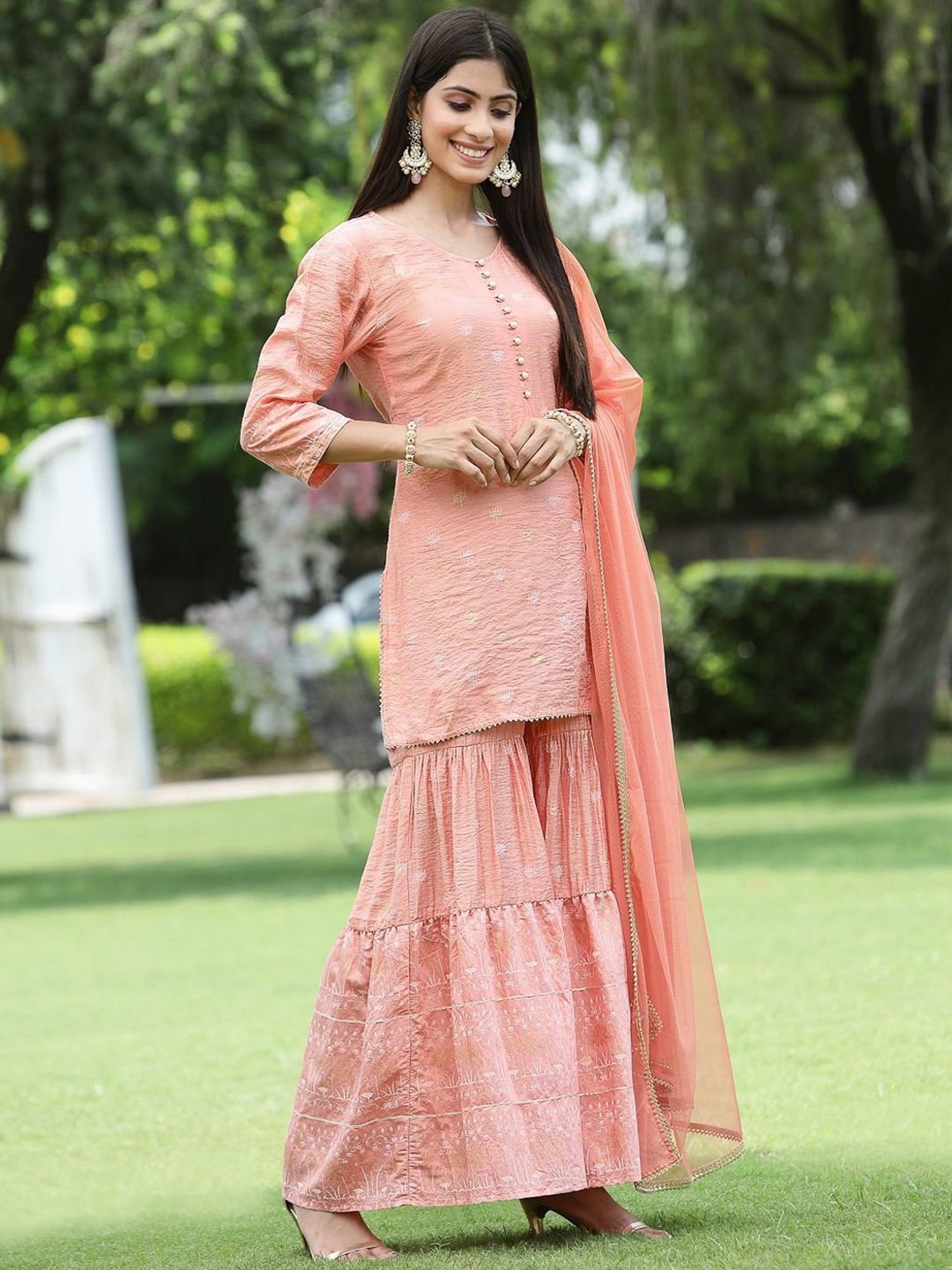 Juniper Peach Ethnic Motif Printed Viscose Muslin Kurta Sharara & Net Dupatta Set