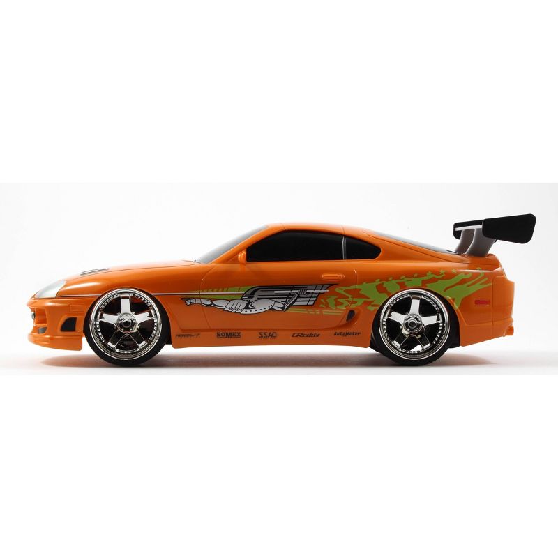 Jada Toys Fast & Furious RC 1995 Toyota Supra Remote Control Vehicle 1:16 Scale Metallic Orange