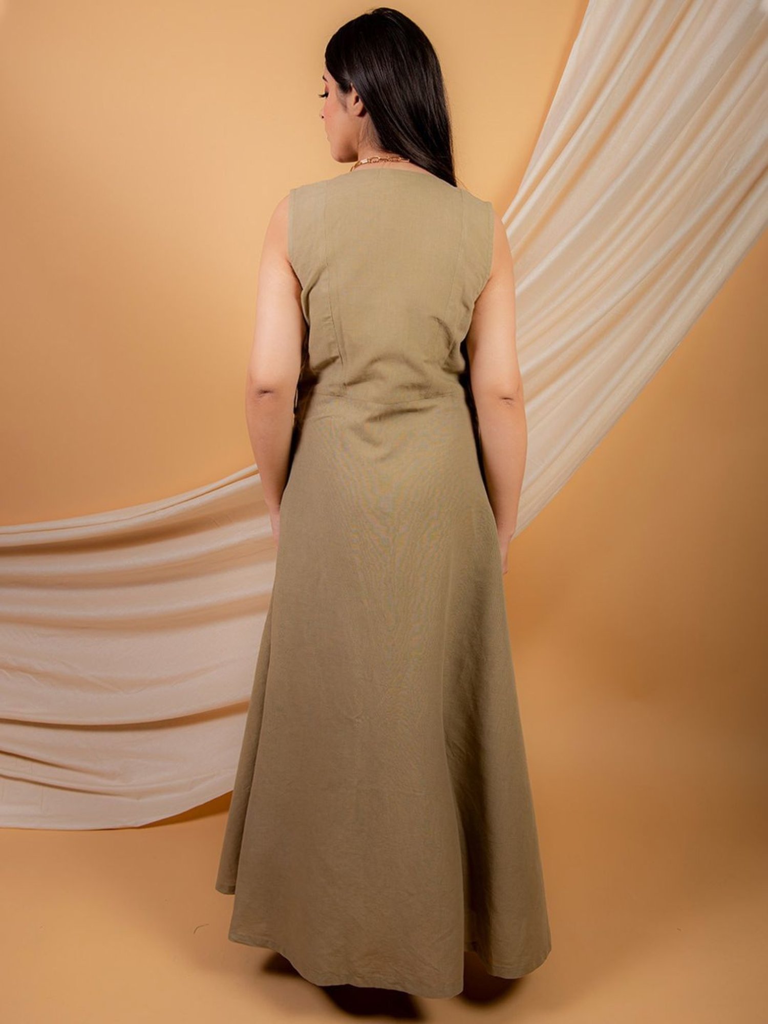 Priya Chaudhary Olive Green Umber Solid Jumpsuit In Cotton Linen Fabric and a Sleeveless Over Wear