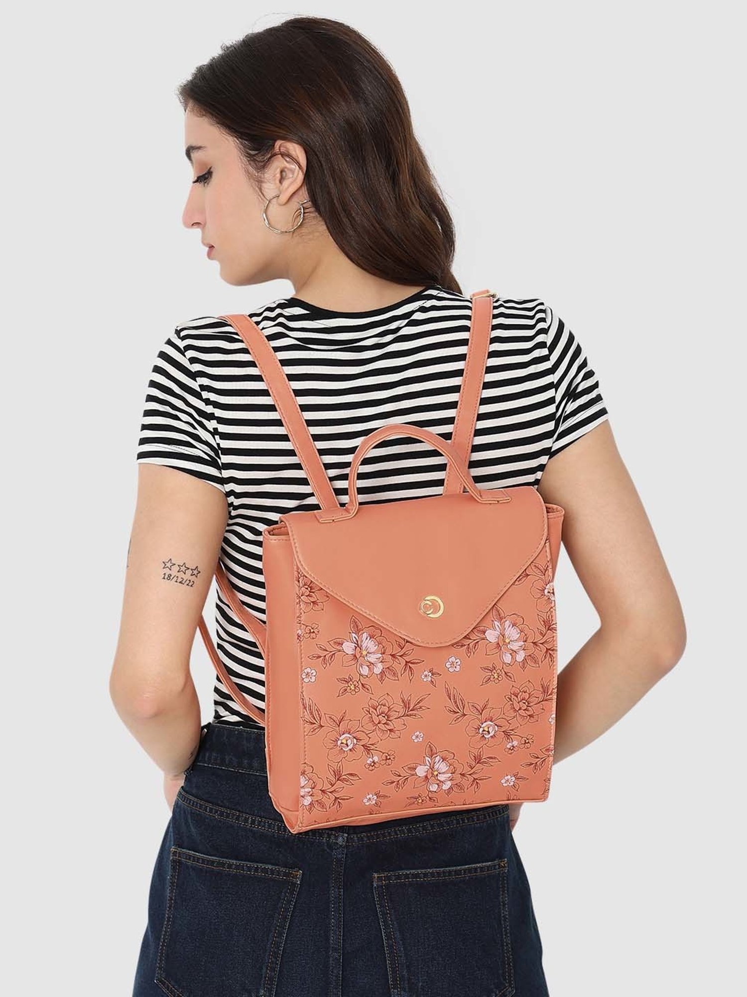 Caprese SNOW Orange Faux Leather Medium Backpack