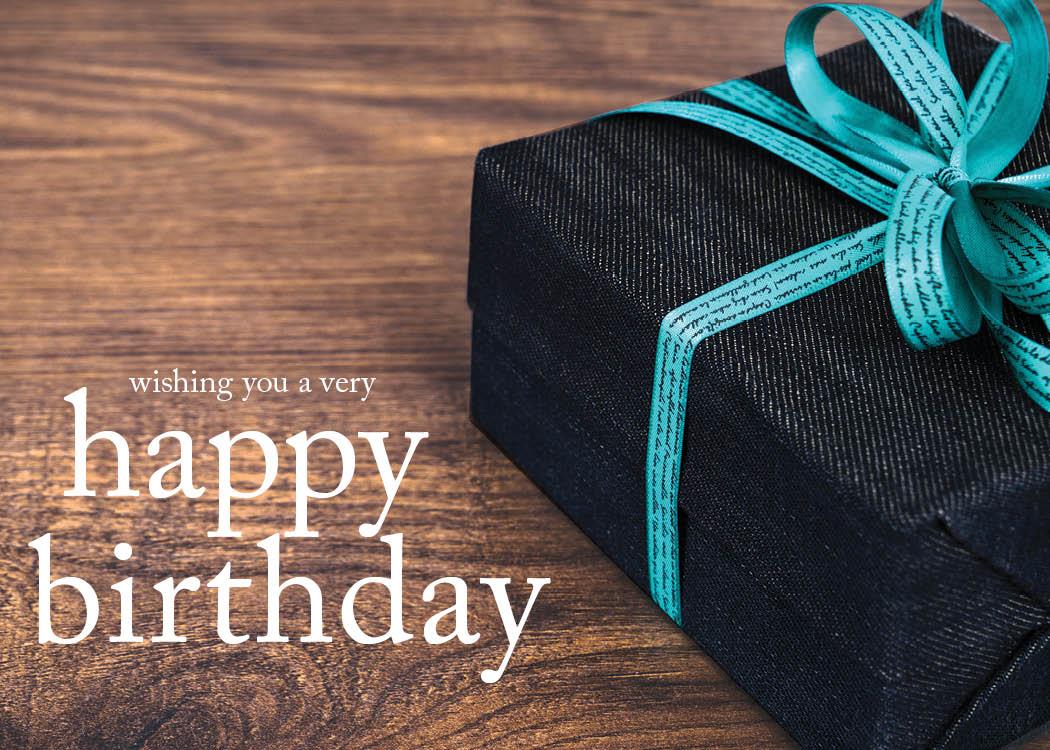 Birthday Greeting Cards - B1702. Business Greeting Card Featuring a Birthday Message Next to a Present with a Bow on a Wooden Background. Box Set Has 25 Greeting Cards and 26 Bright White Envelopes.