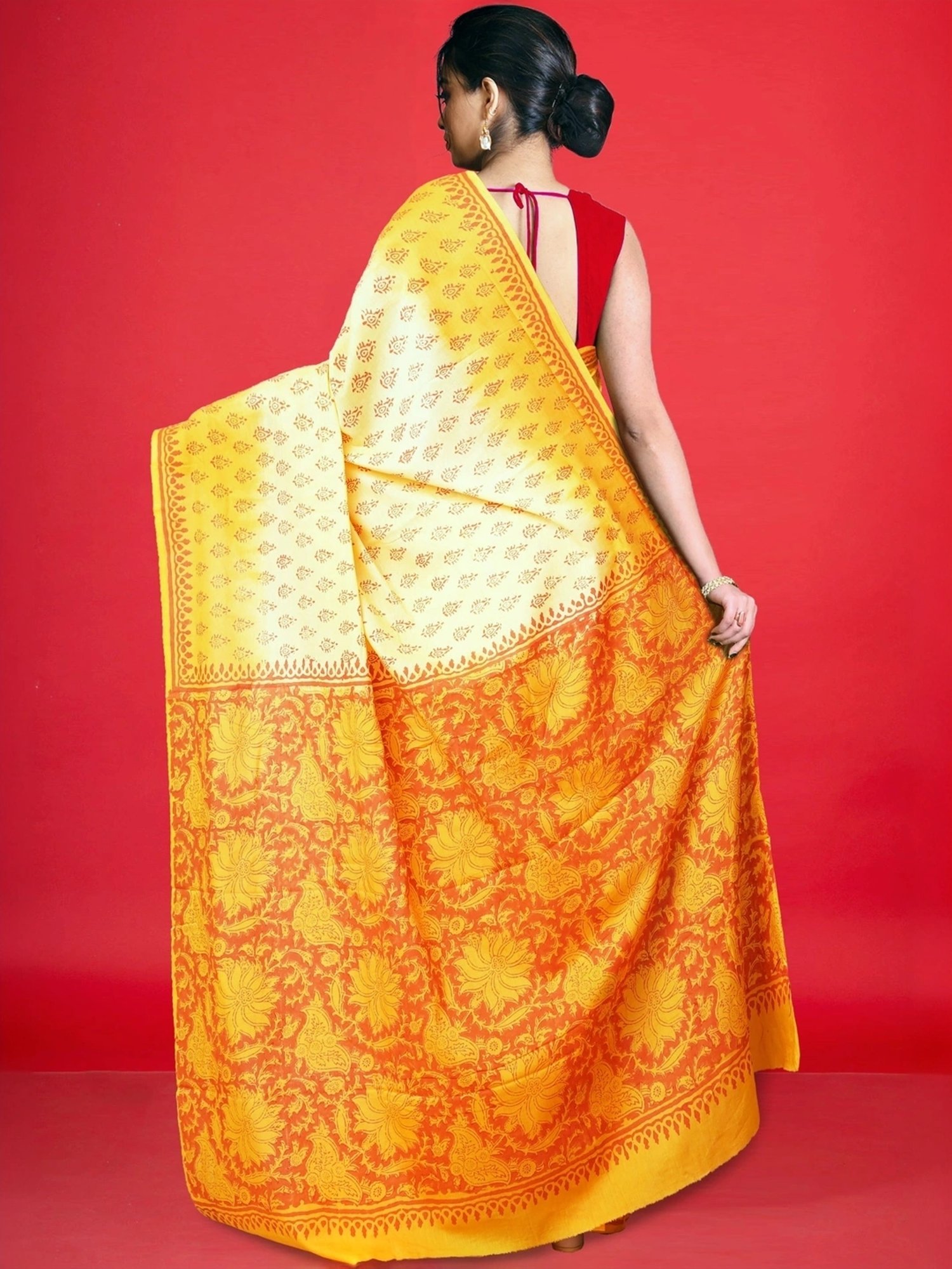 Unnati Silks Cream & Orange Cotton Printed Saree With Unstitched Blouse