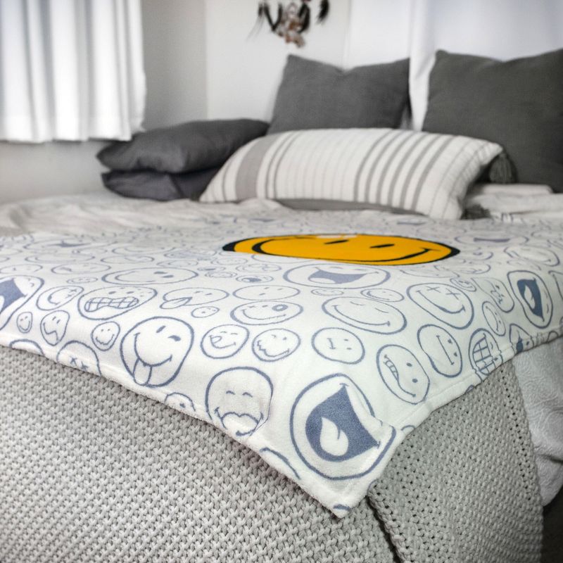 Commonwealth Toys OFFICIAL Smiley World Soft Throw Blanket | Cute Plush Blanket | 50 x 60 Inches