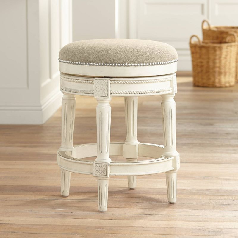 55 Downing Street Oliver 24" Cream Fabric Backless Swivel Seat Counter Stool