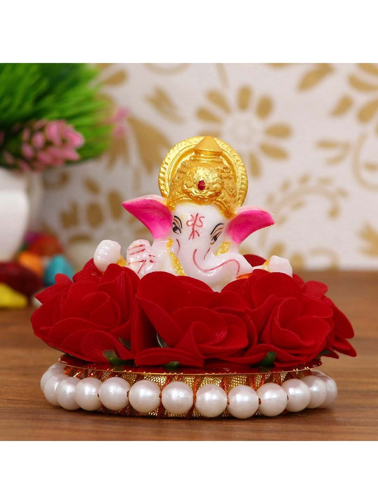 eCraftIndia Lord Ganesha Idol on Decorative Handcrafted Plate with Red Flowers