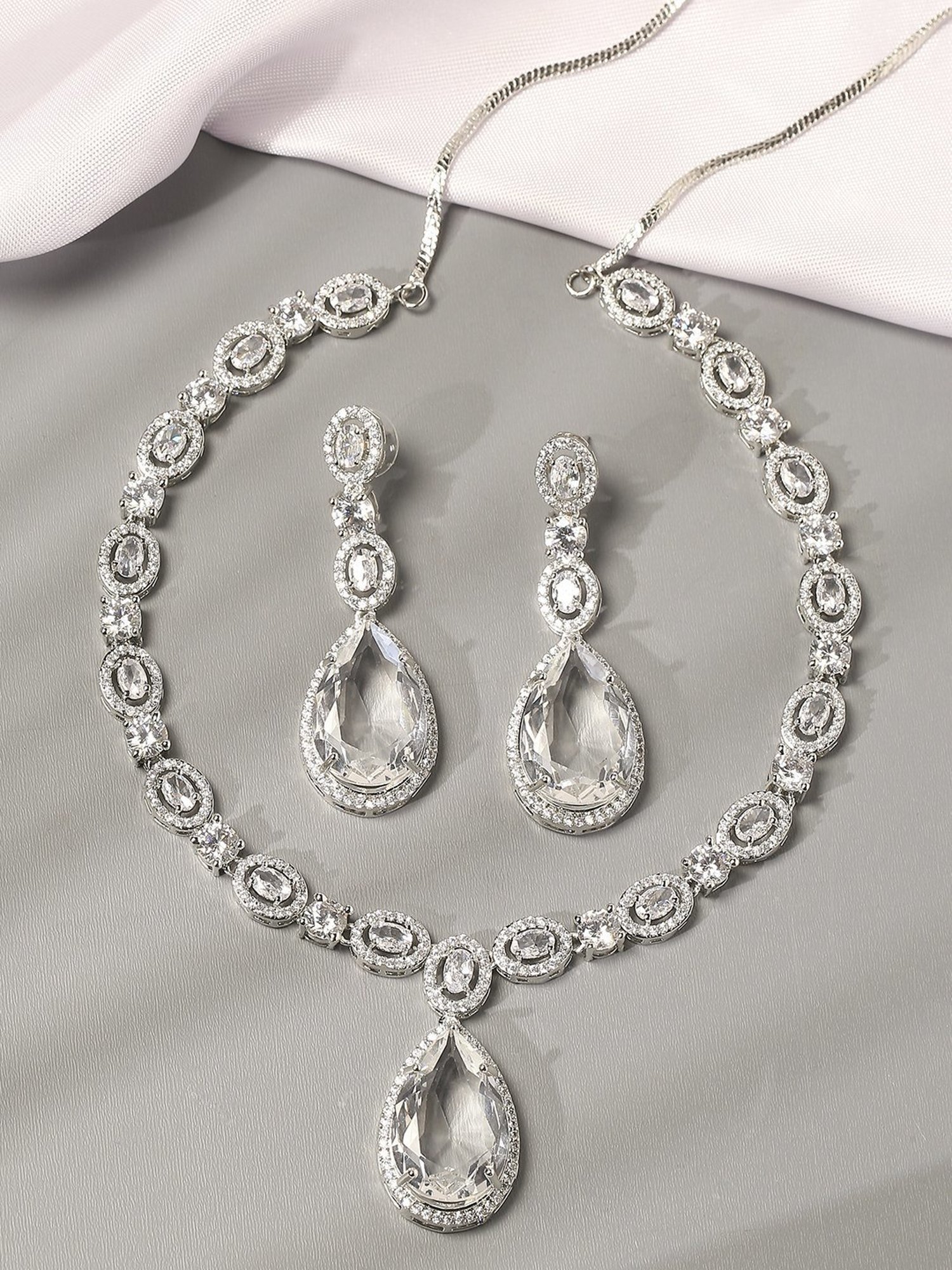 OOMPH Silver Tone American Diamond TearDrop Pendant Necklace Set with Earrings