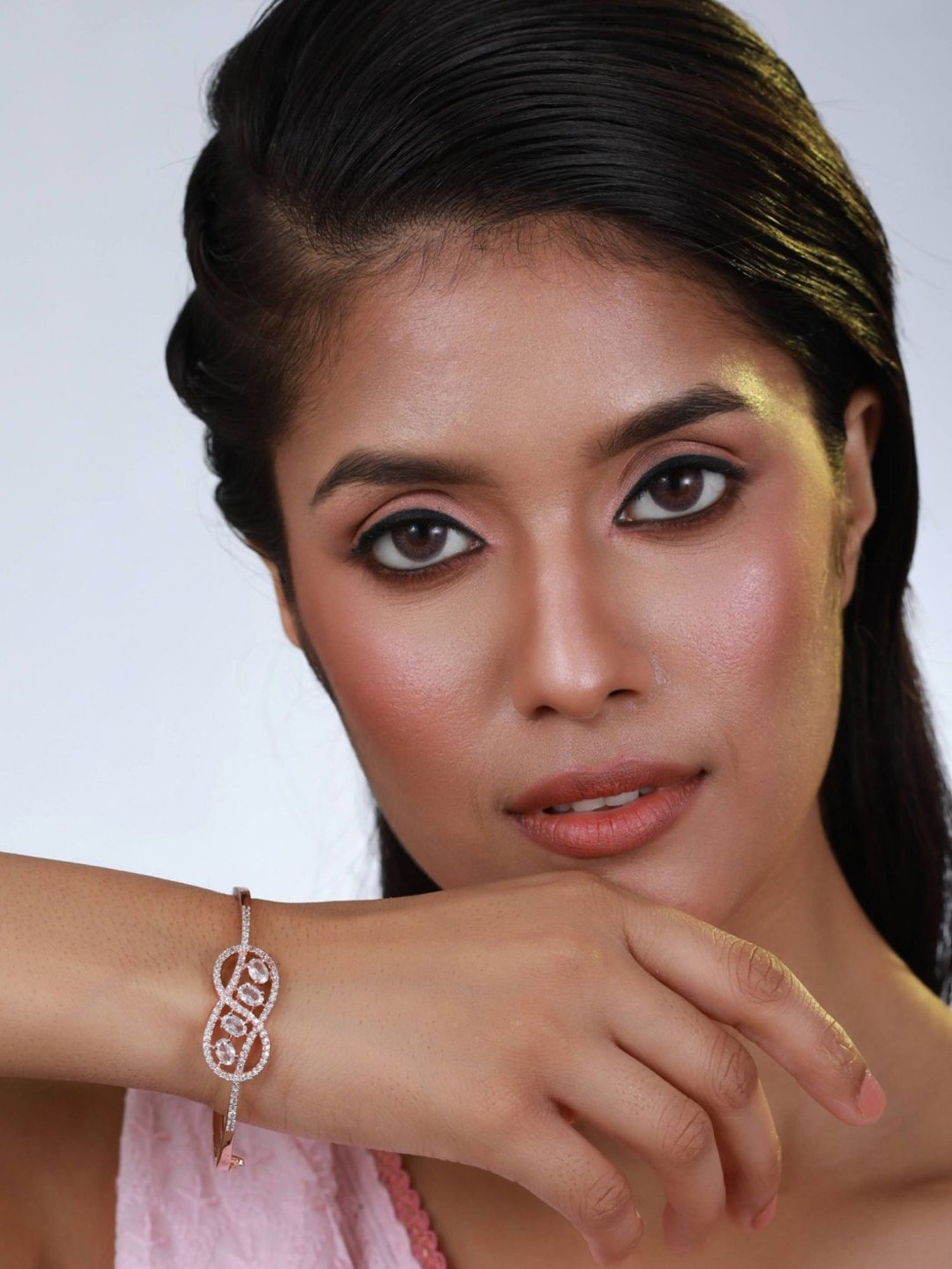 Aatmana Rose Gold-Plated Handcrafted Infinity Shaped Bangle-Style Bracelet