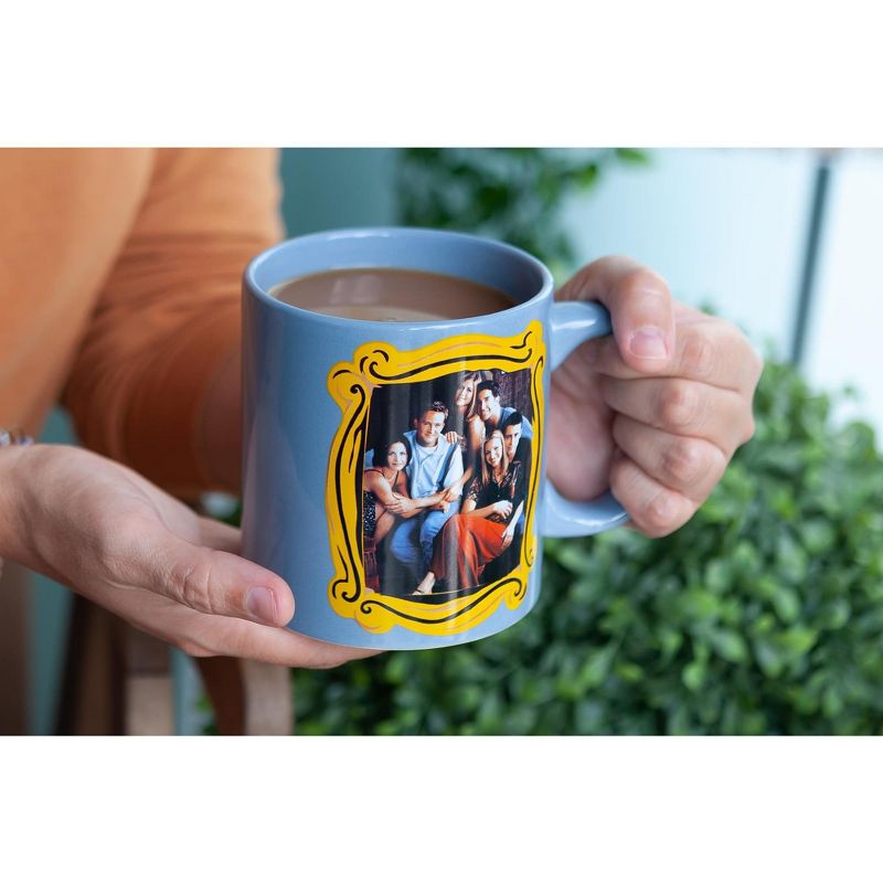 Silver Buffalo Friends Blue Coffee Mug | Friends Group In Monica's Frame | Cup Holds 20 Ounces