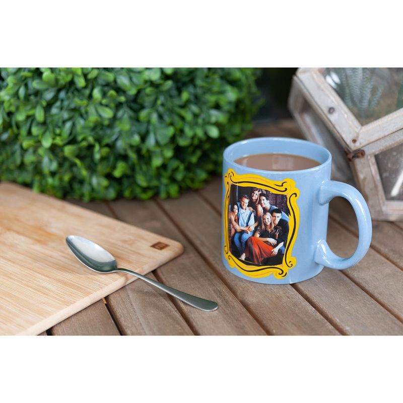 Silver Buffalo Friends Blue Coffee Mug | Friends Group In Monica's Frame | Cup Holds 20 Ounces