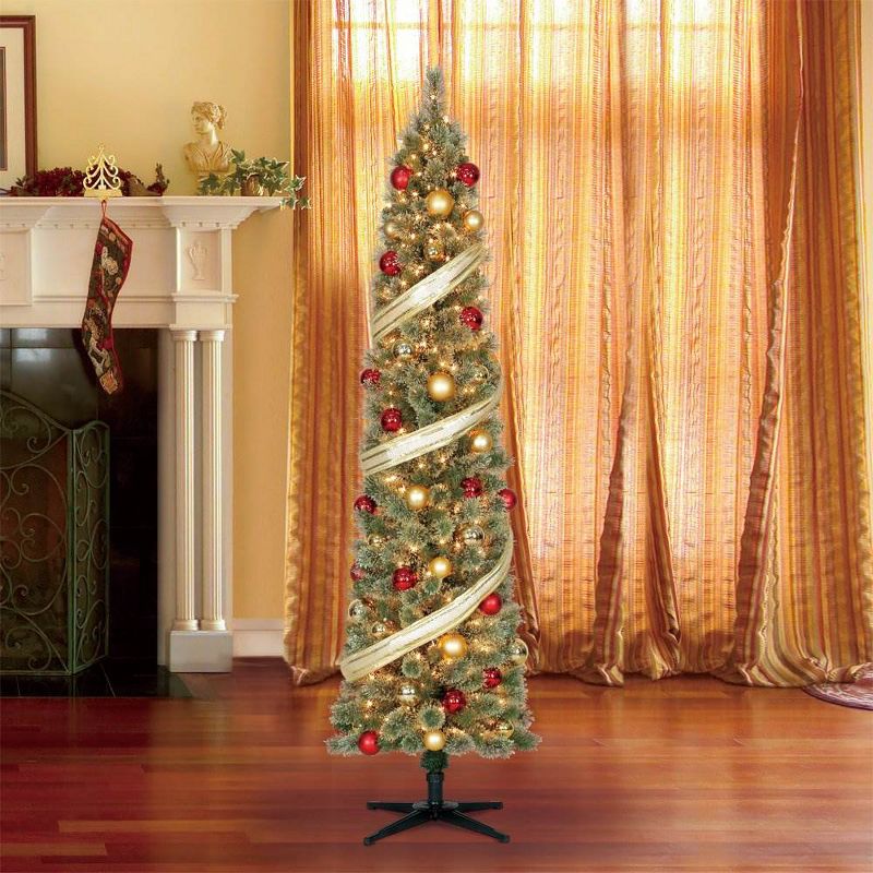 Home Heritage 7 Foot Pre-Lit Skinny Artificial Stanley Pencil Pine Christmas Tree with Clear White Lights, Foldable Stand and Easy Assembly
