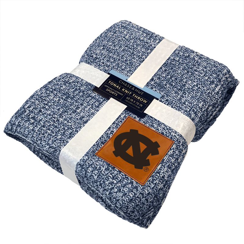 NCAA North Carolina Tar Heels Two- Tone Sweater Knit Throw Blanket with Faux Leather Logo Patch