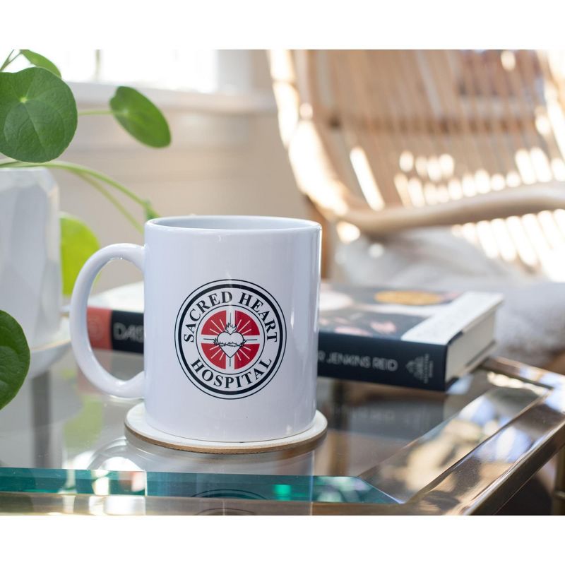 Surreal Entertainment Scrubs Sacred Hearts Hospital Logo Ceramic Mug | Holds 11 Ounces