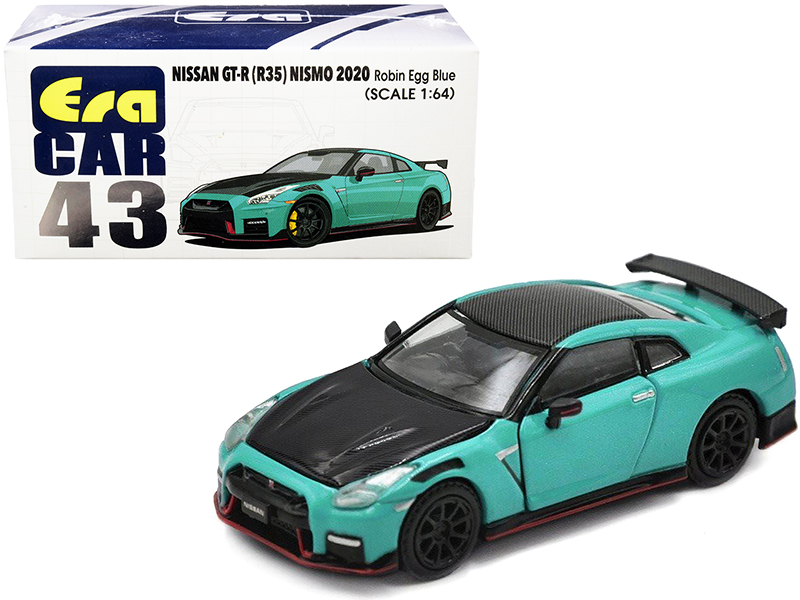 1999 Nissan Skyline GT-R RHD (Right Hand Drive) Blue Metallic with Poker Chip Collector's Token and Game Card "Trivial Pursuit" "Pop Culture" 2022 Release 2 1/64 Diecast Model Car by Johnny Lightning