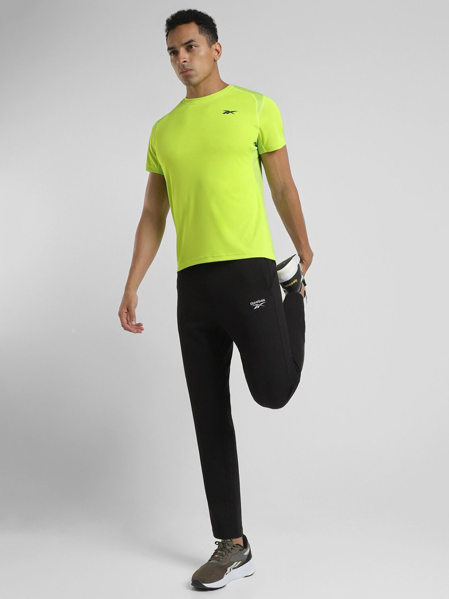 Reebok Green Polyester Regular Fit Solid T Shirt