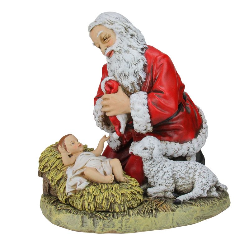 Roman 13.25" Red and White Kneeling Santa with Baby Jesus Christmas Figure