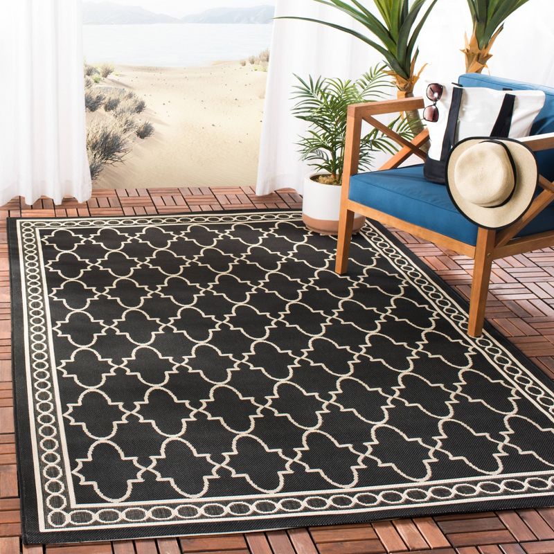 6'7"X9'6" Gibson Outdoor Rug Black/Beige - Safavieh