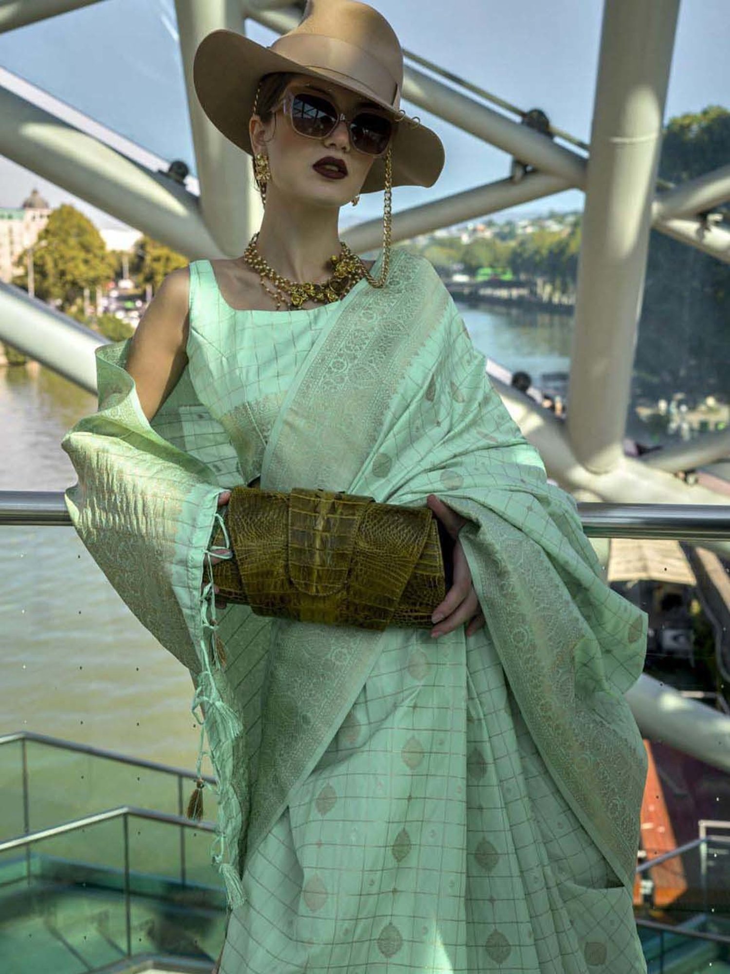 Elora Turquoise Silk Woven Saree With Unstitched Blouse