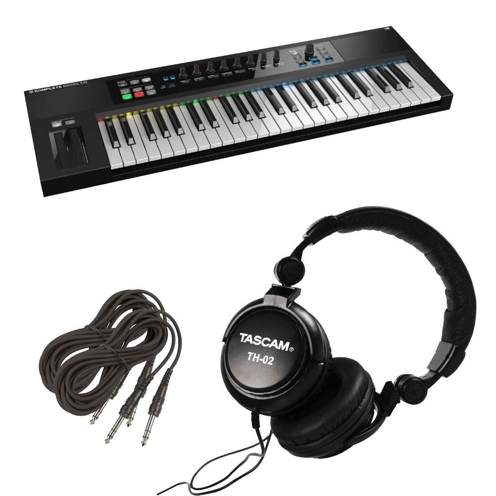 Native Instruments Komplete Kontrol S49 Keyboard. W/ Free Tascam and 2 TRS Cables.
