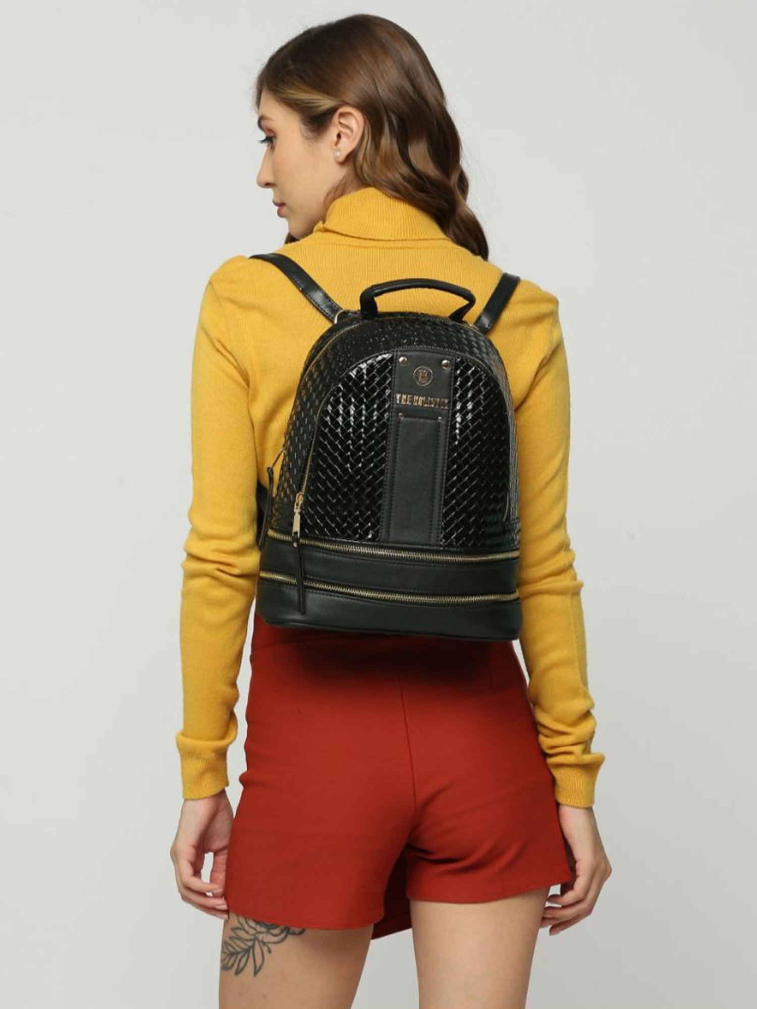THE HOLISTIK Retro Wave Black Textured Medium Backpack