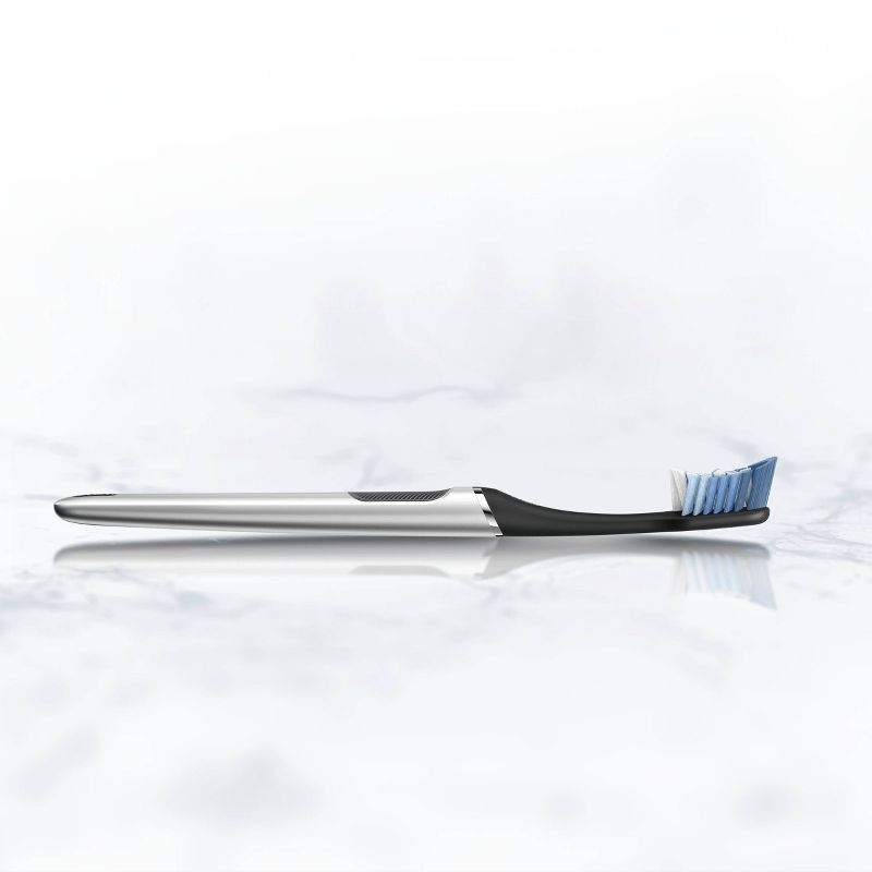 Oral-B Clic Toothbrush - Chrome Black with 2 Replaceable Brush Heads and Magnetic Holder