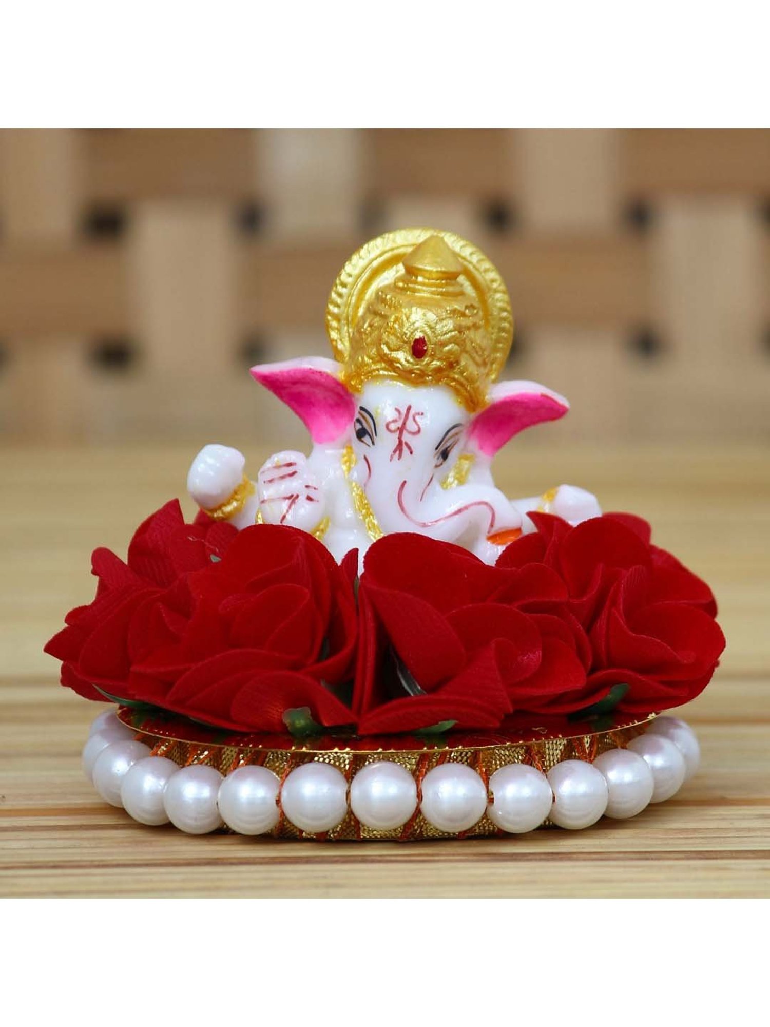 eCraftIndia Lord Ganesha Idol on Decorative Handcrafted Plate with Red Flowers