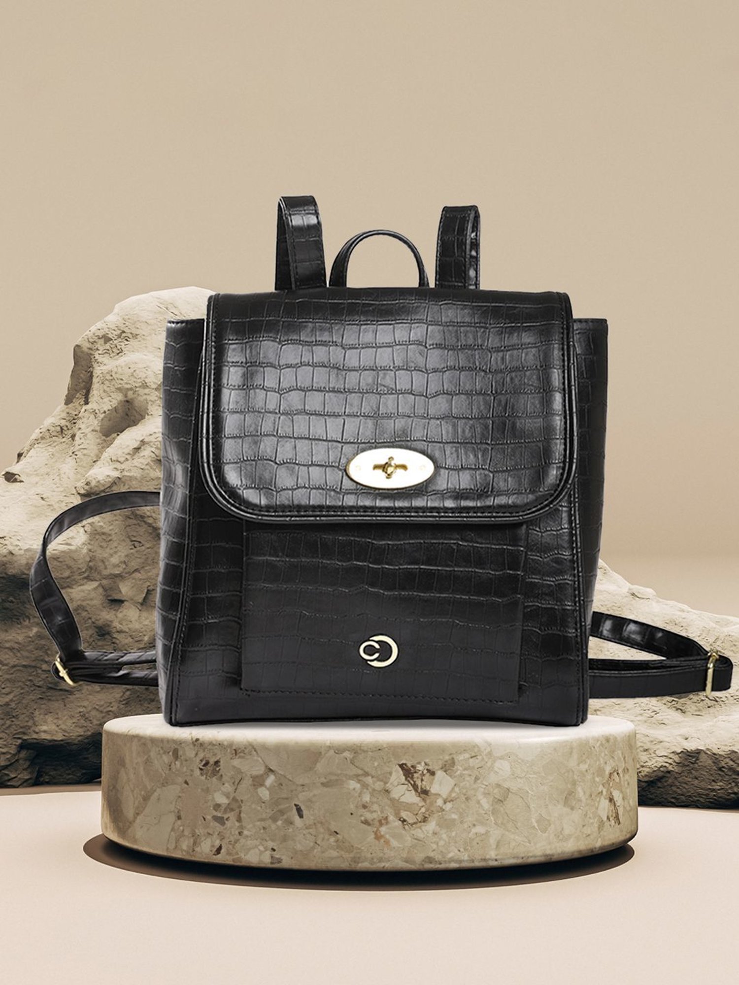 Caprese Treza Black Faux Leather Textured Backpack