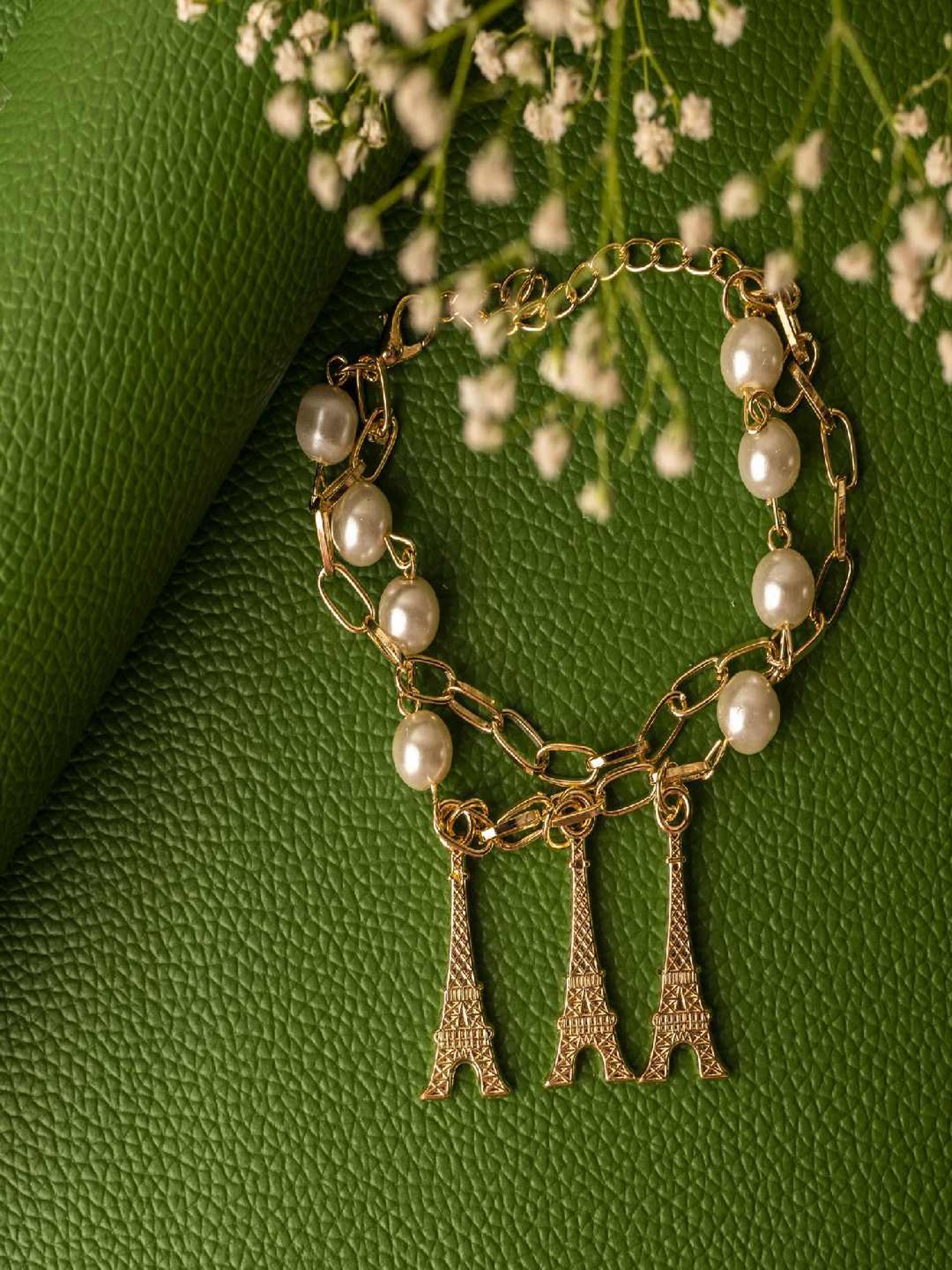 Jewelz White Pearl Gold Plated Alloy Eiffel Tower Shape Bracelet for Women