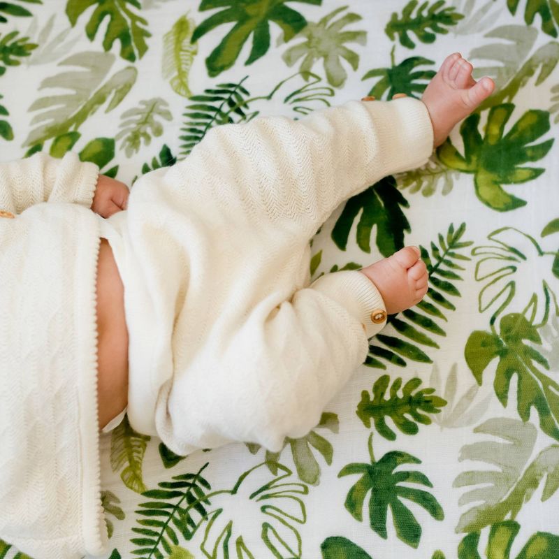 Little Unicorn Cotton Muslin Fitted Crib Sheet - Tropical Leaf