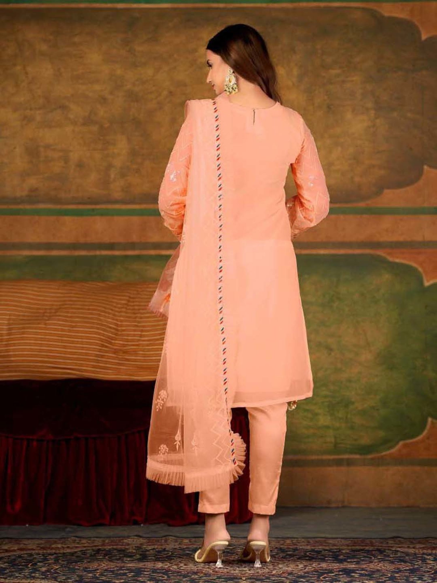 Warthy Ent Orange Embellished Semi Stitched Dress Material