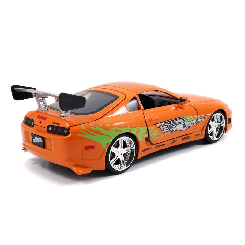 Jada Toys Hollywood Rides Fast & Furious 1995 Toyota Supra Die-Cast Vehicle with Brian Die-Cast Figure 1:24 Scale Metallic Orange