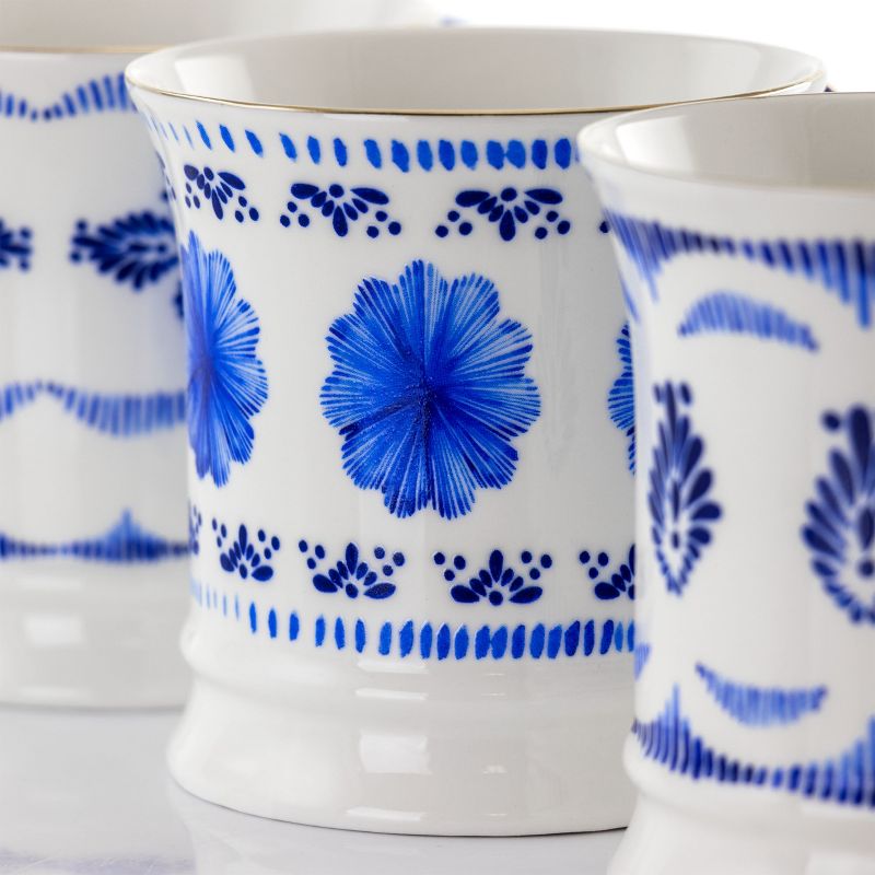 Meritage Navy 12 Piece 13.2 Ounce Fine Ceramic Cup Set in White with 4 Assorted Designs