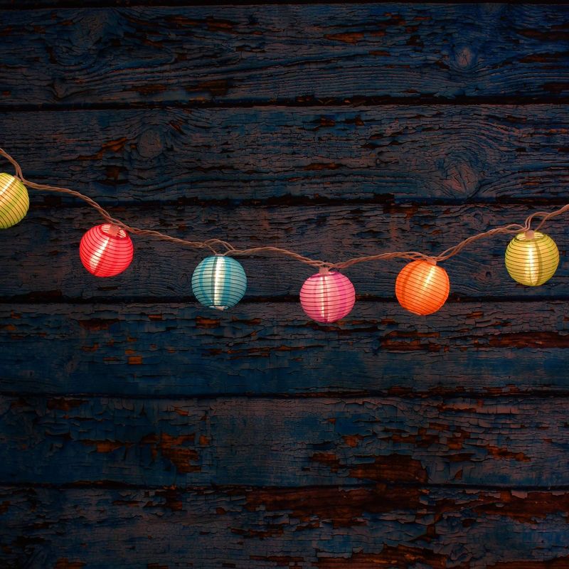 10ct Electric String Lights with 3"x7' Nylon Lanterns- Multi Color