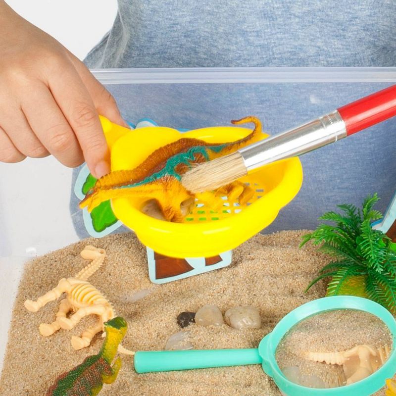 Dinosaur Dig Sensory Bin - Creativity for Kids