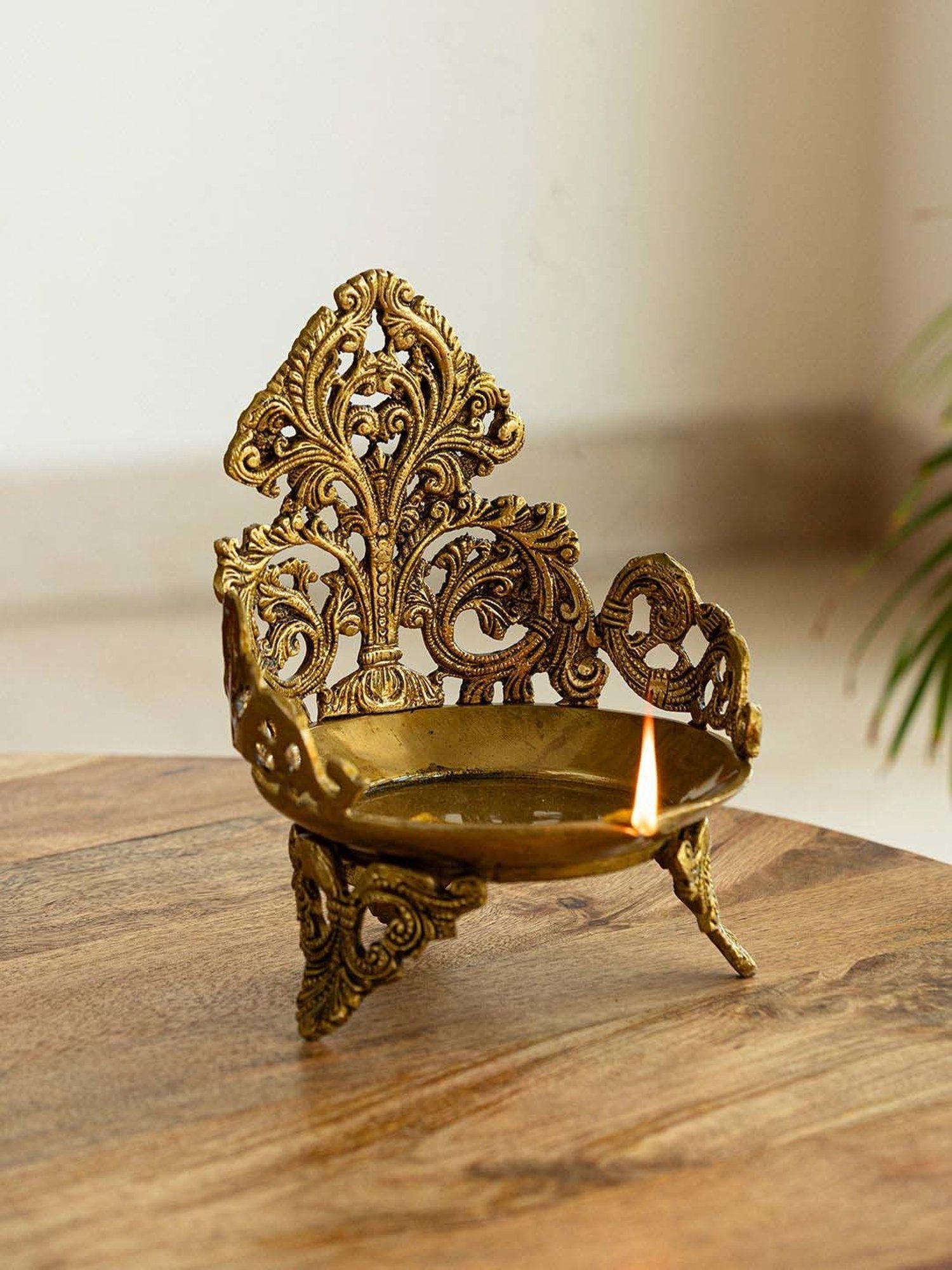 ExclusiveLane Golden Brass Zeenat Three Handcarved Legs 1 Wick Diya