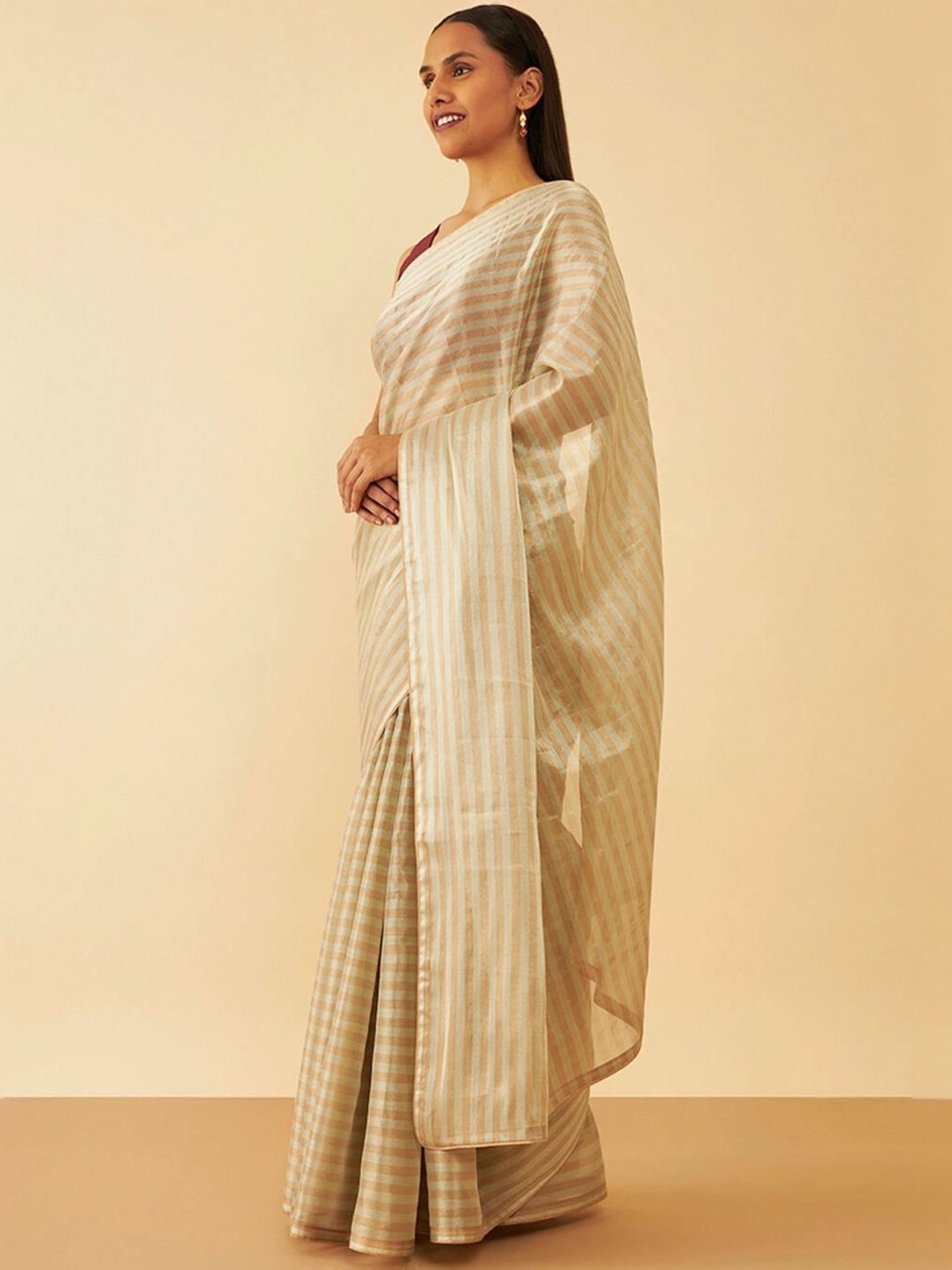 Taneira Beige Striped Saree With Unstitched Blouse