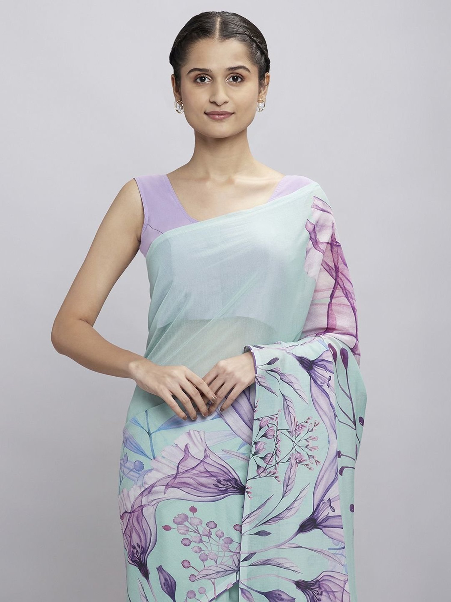 Navyasa Blue Liva Georgette Floral Printed Saree With Coordinated Unstitched Blouse Piece