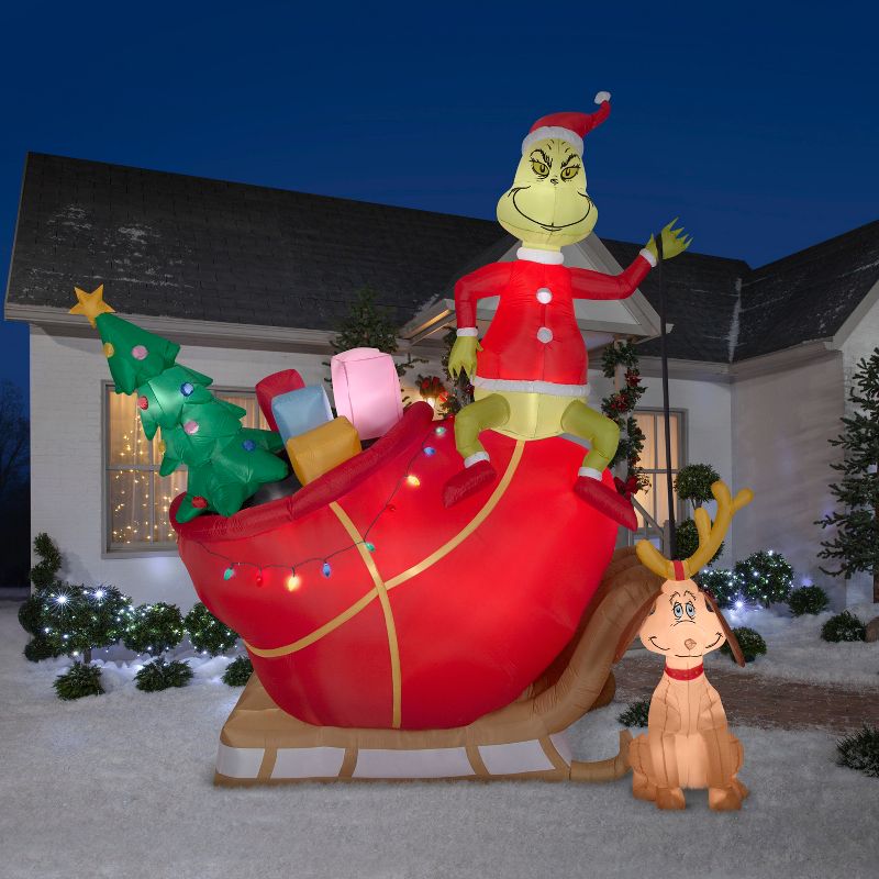 Gemmy Christmas Airblown Inflatable Grinch and Max in Sleigh Colossal Scene Grinch, 12 ft Tall