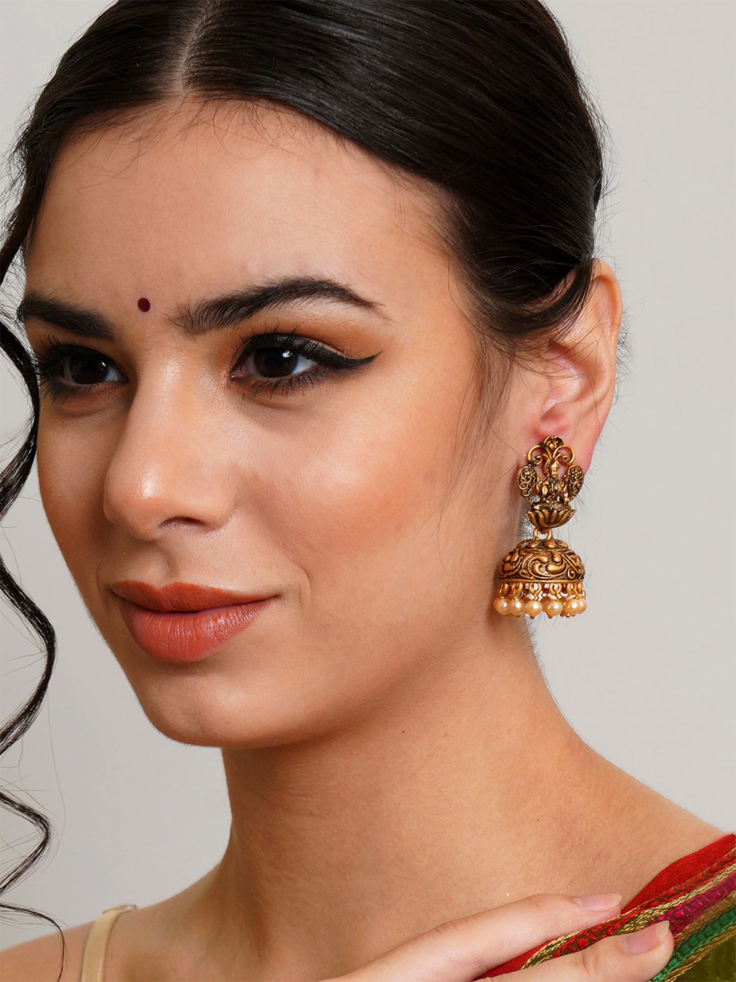 Karatcart Gold-Plated Mata Laxmi Jhumki Earrings