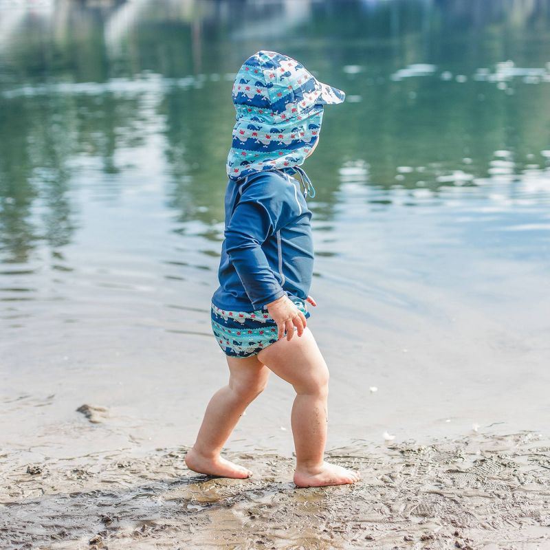 i play by green sprouts Baby Boys' Whale Stripe Reversible Flap Swim Hat - Navy/Aqua/Gray 0-6M