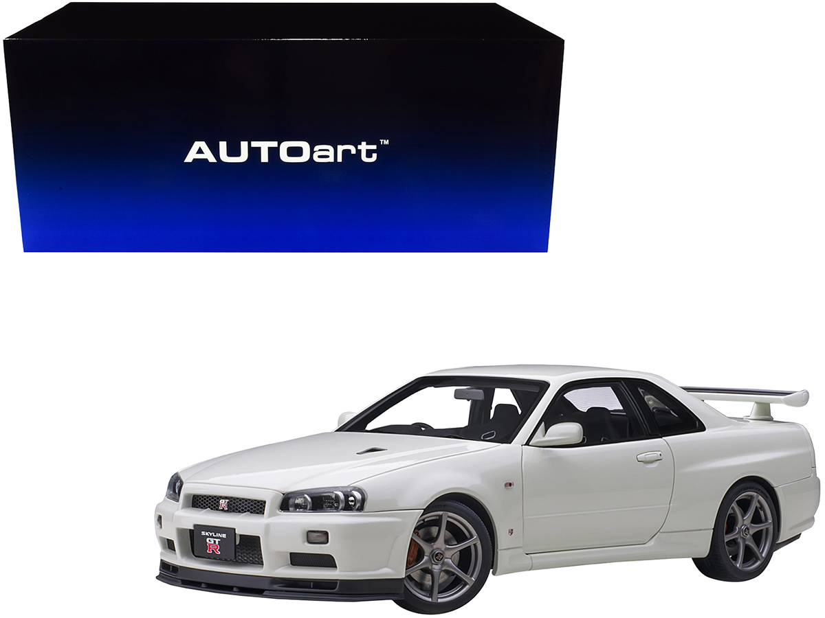 1999 Nissan Skyline GT-R RHD (Right Hand Drive) Blue Metallic with Poker Chip Collector's Token and Game Card "Trivial Pursuit" "Pop Culture" 2022 Release 2 1/64 Diecast Model Car by Johnny Lightning