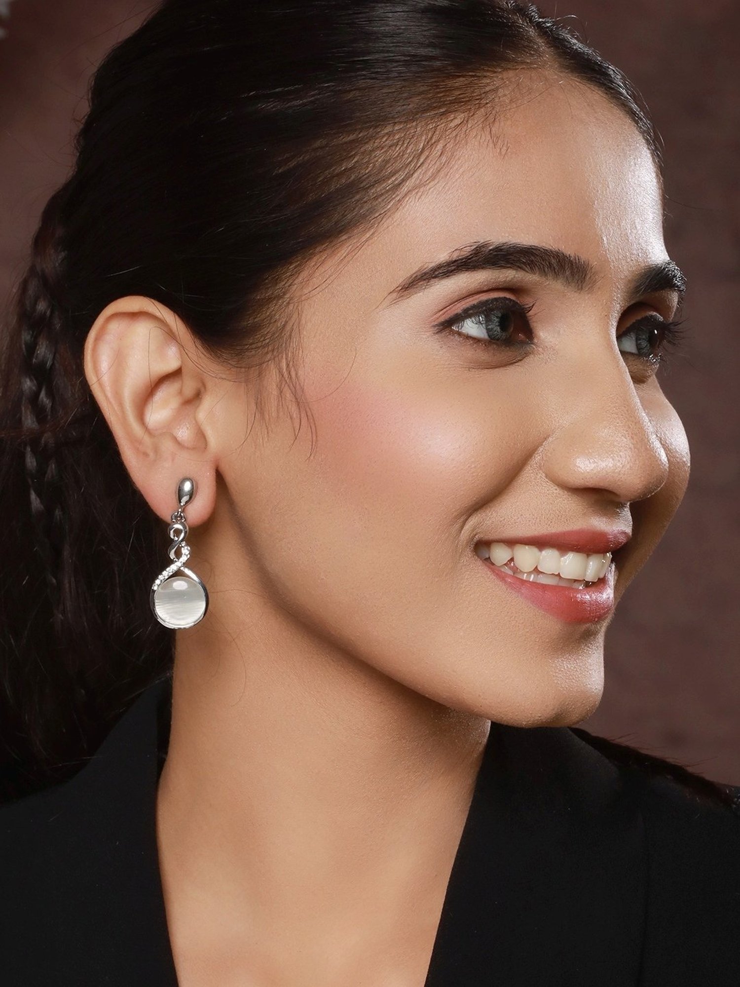 Prita by Priyaasi Twisted Tear Studded AD Silver-Plated Dangler Earrings