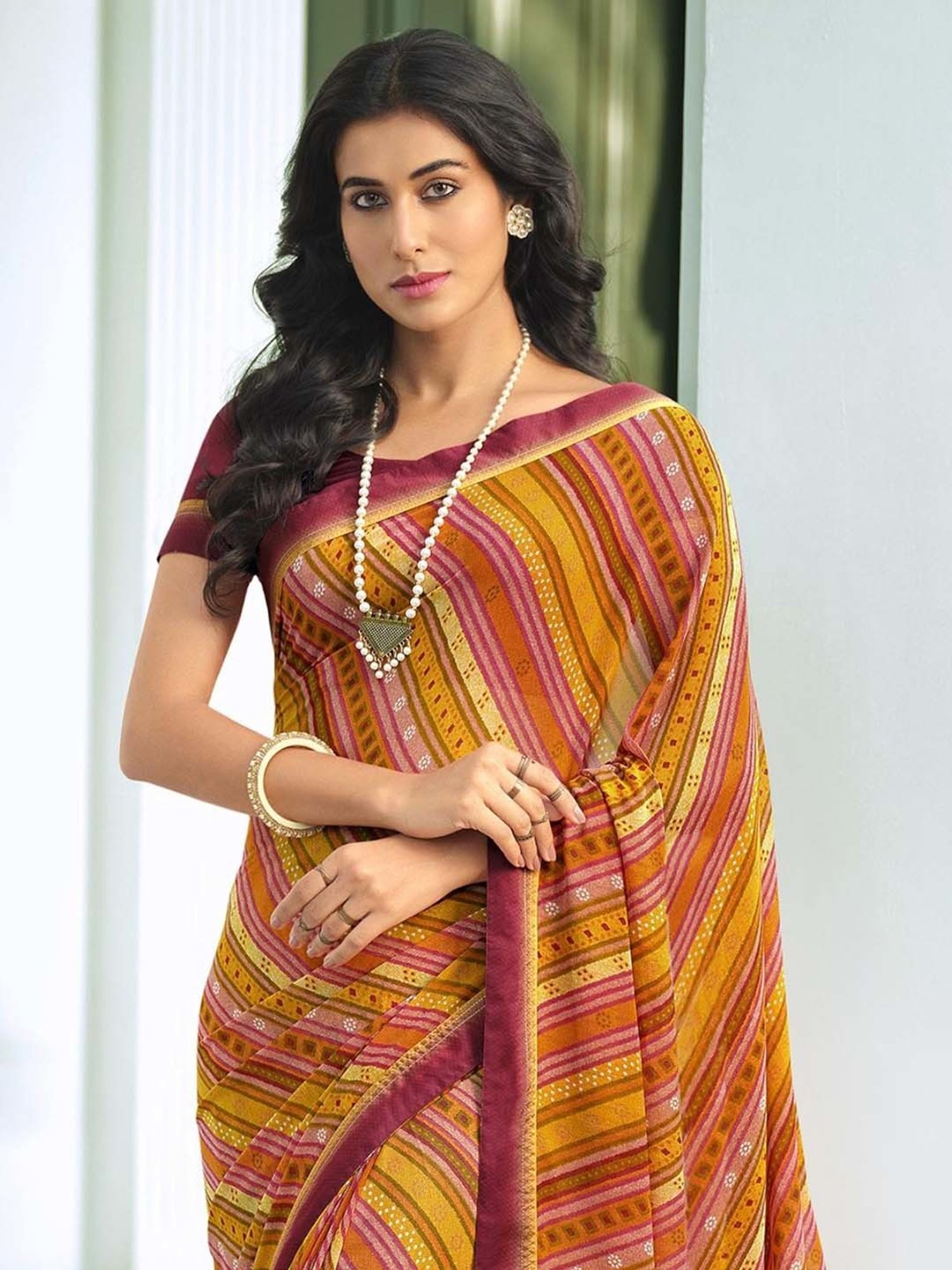 Rangita Orange Printed Saree With Blouse