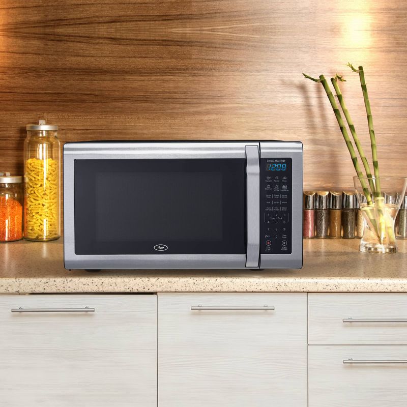 Oster 1.6 cu ft 1100W Microwave - Stainless Steel OGCMWX16S2BS-11