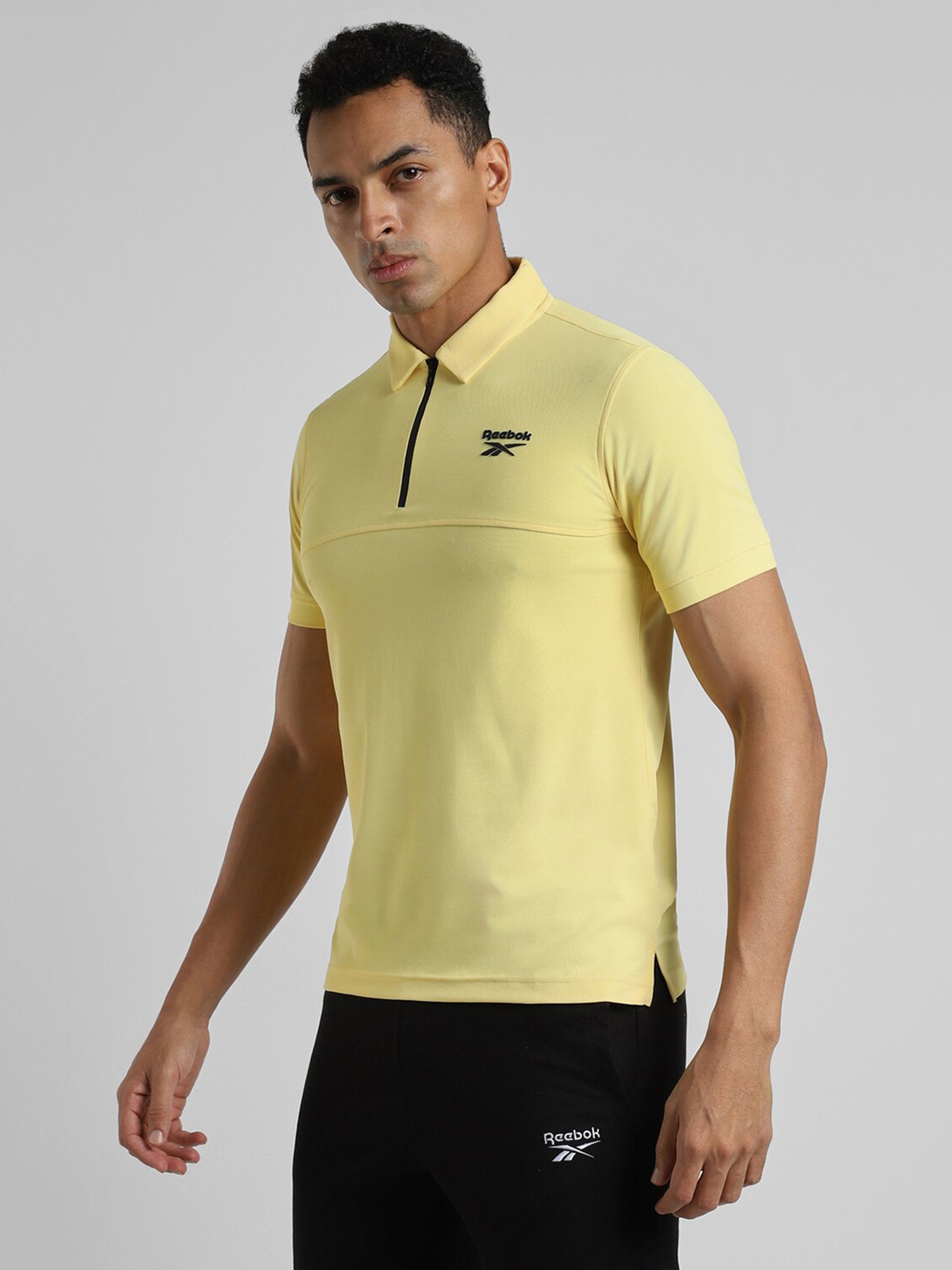 Reebok Yellow Polyester Slim Fit Solid Polo T-Shirt